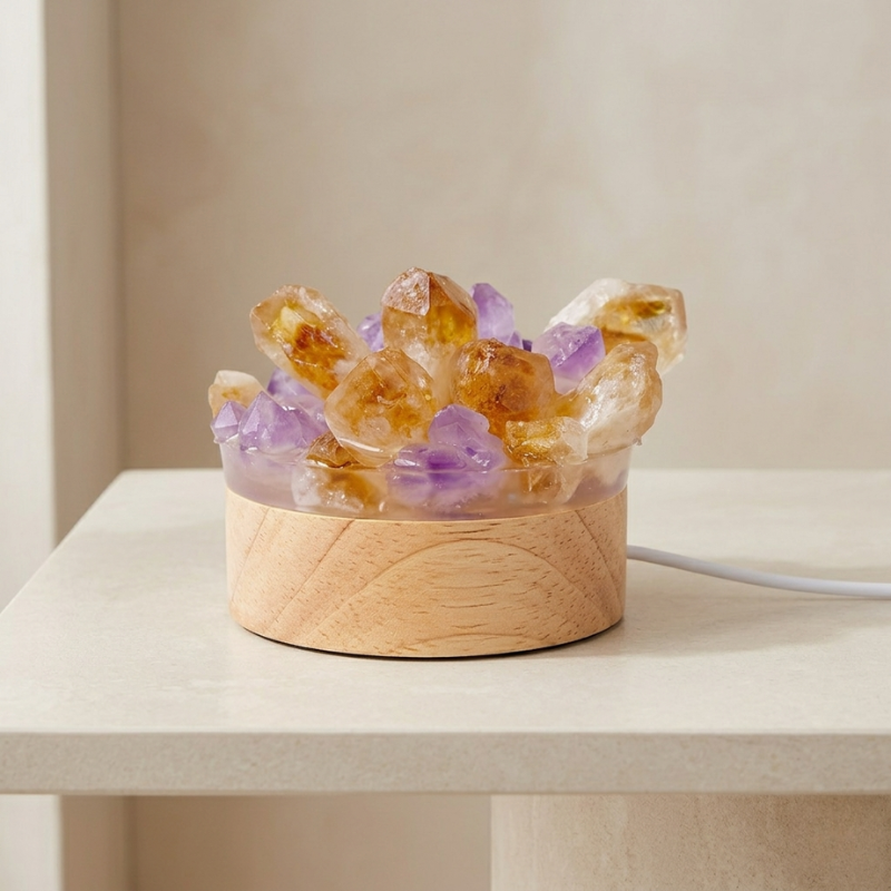 Crystal lamp with wooden base on a light surface