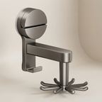 A modern wall-mounted faucet with a circular top, a horizontal spout, and a multi-pronged base, shown in a brushed metallic finish against a warm beige background.