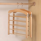 Wooden hanger with multiple hooks on a wooden rod against a neutral background
