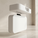 Modern wall-mounted light fixture on a neutral background