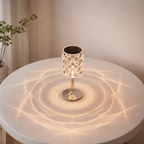 Decorative table lamp on a round white table with a soft background