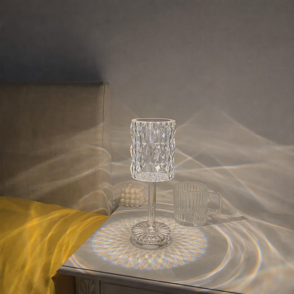Crystal glass on a reflective surface with a soft, diffused light