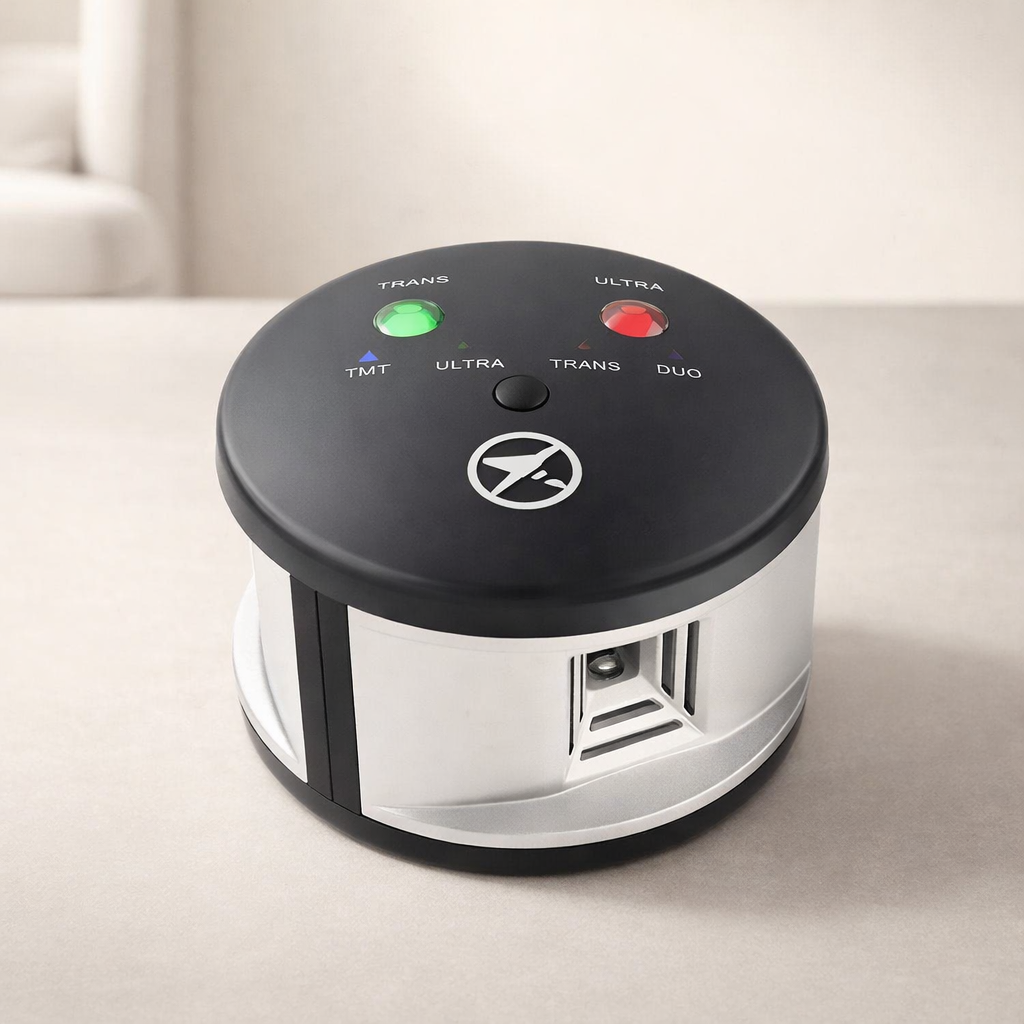 Round electronic device with buttons and indicator lights on a light surface