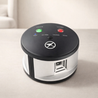 Round electronic device with buttons and indicator lights on a light surface