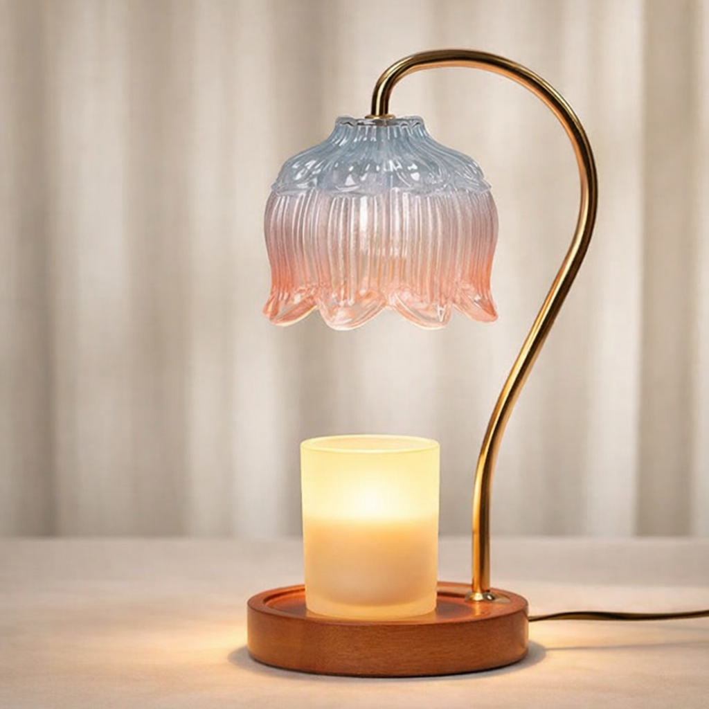 Decorative table lamp with a glass shade and wooden base on a neutral background