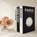 Three books titled 'Paris', 'New York', and 'London' with floral designs on a light background.