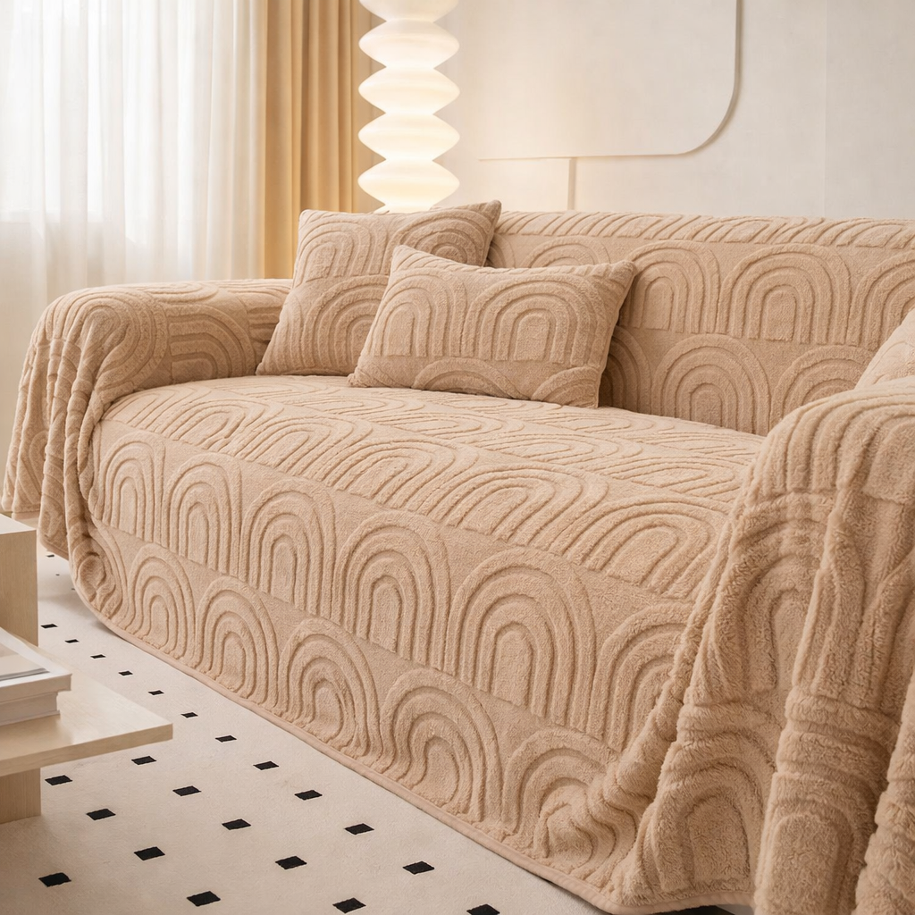 Beige textured sofa cover on a couch in a modern living room.