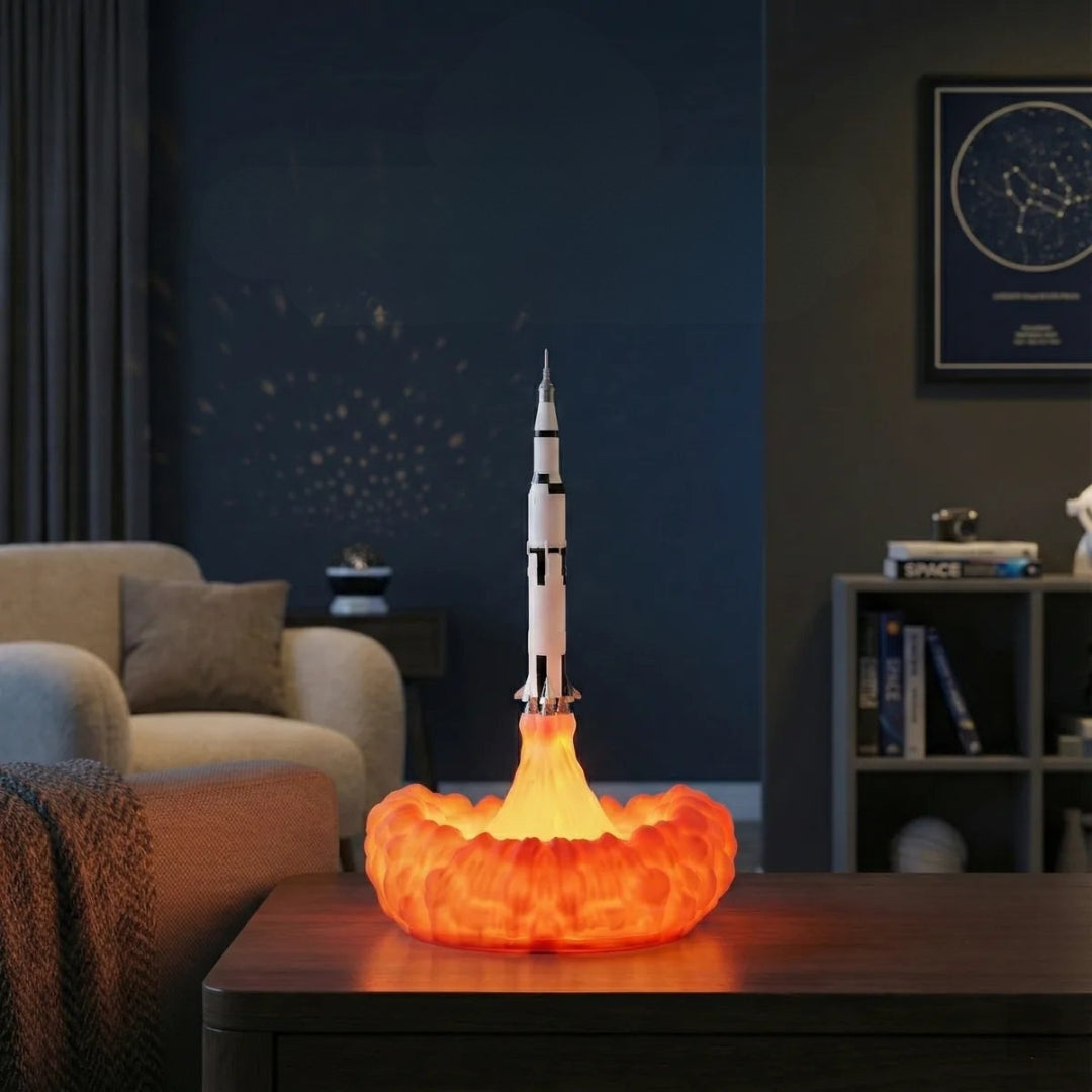 Model rocket on a glowing orange base in a living room setting
