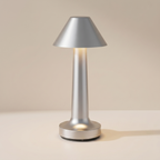 Silver outdoor lamp on a beige background