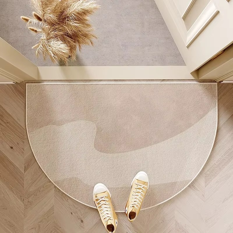 Hemispherical doormat with gold shoes on a wooden floor