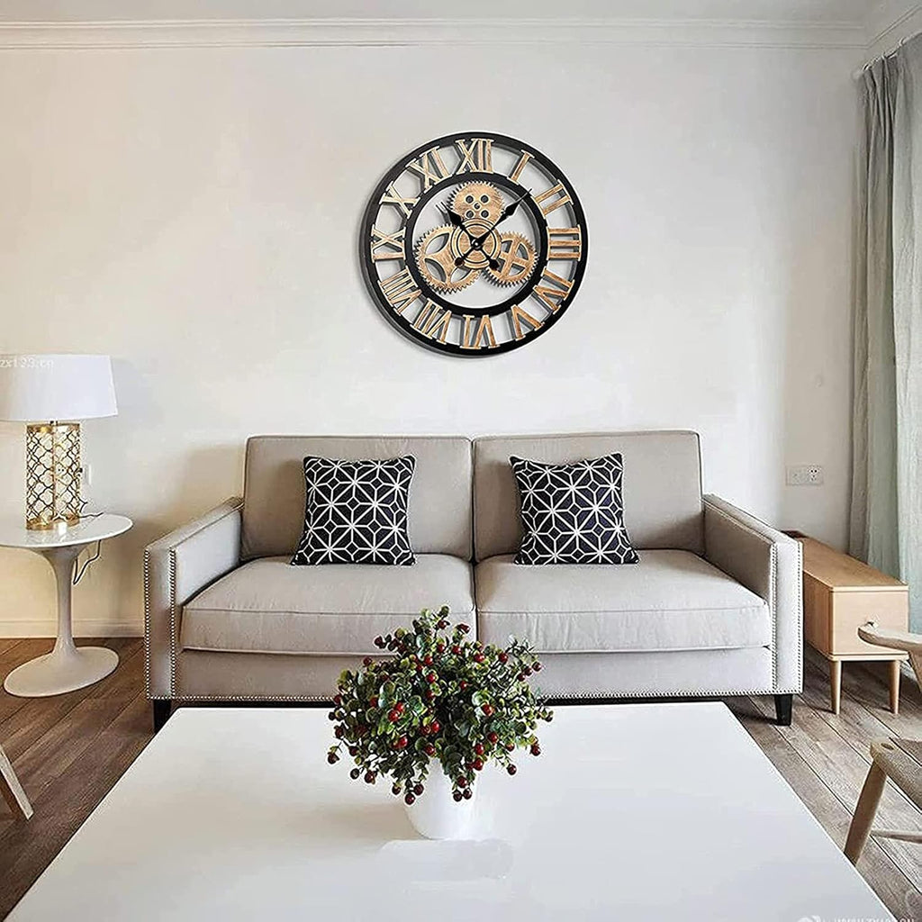 Living room with a beige sofa, decorative pillows, and a wall clock.