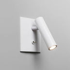 White wall-mounted light fixture on a gray background