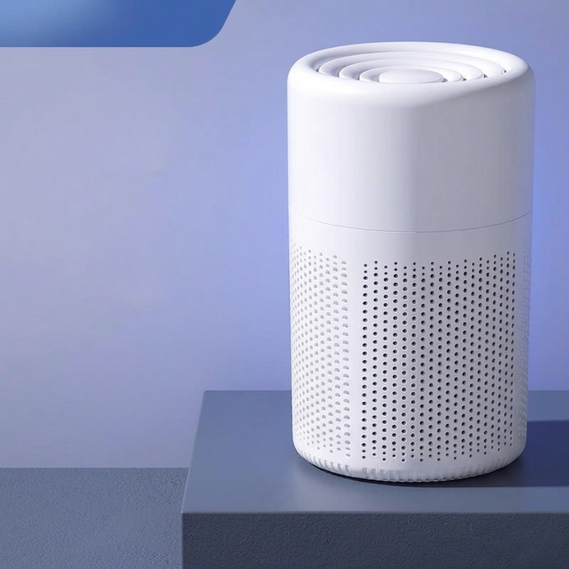 White cylindrical air purifier on a blue background