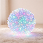 Decorative light ball with pastel colors on a soft surface