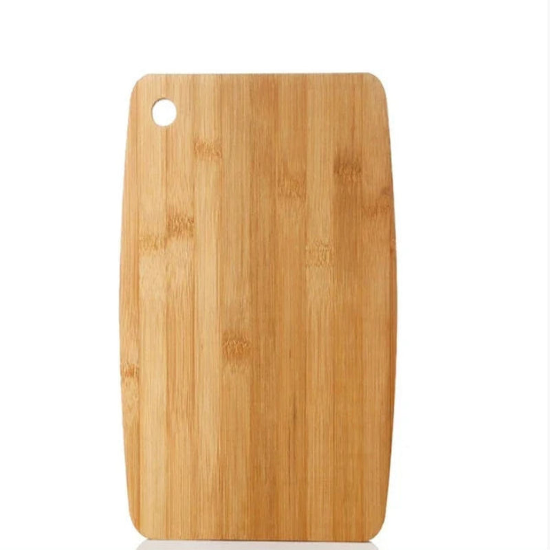 Wooden cutting board with a round hole on a white background