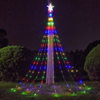 A tall outdoor Christmas tree light display on a pole at night, with a glowing star on top and multicolored string lights forming a tree shape on the pole and spreading out onto the grass.