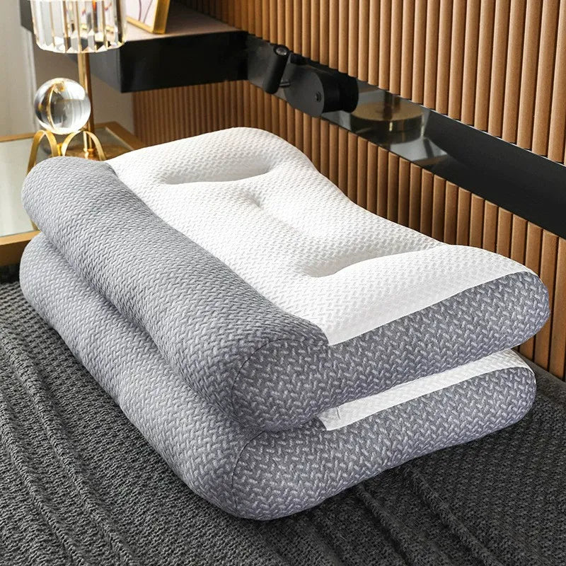 Gray and white pillow on a bed with a wooden headboard