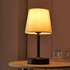 Table lamp on a round table with a blurred background