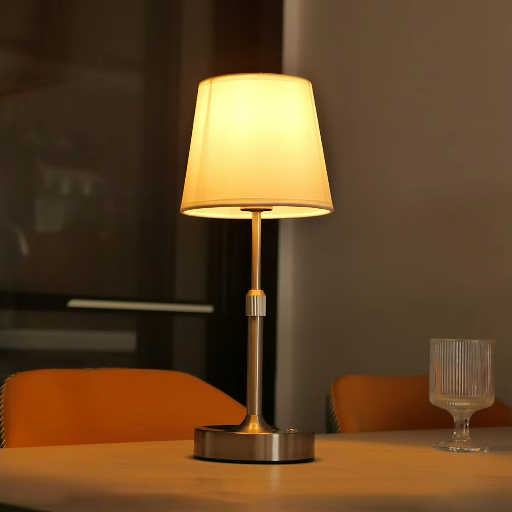 Table lamp on a wooden table with a blurred background
