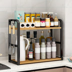 Kitchen shelf with various items including bottles, jars, and utensils on a tiled wall background.