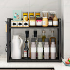 Kitchen shelf with various bottles and containers on a tiled wall background