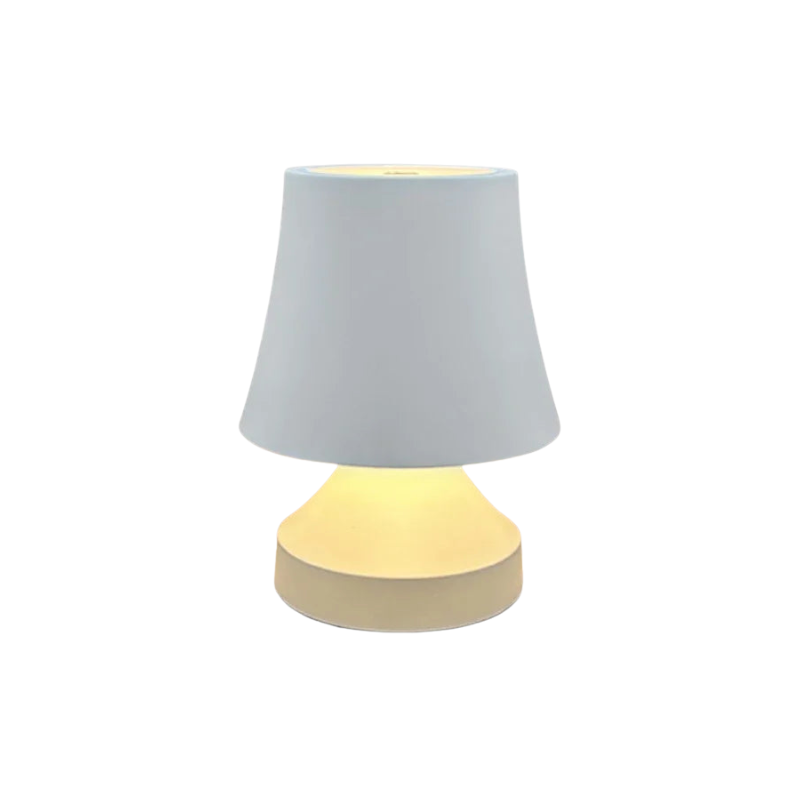 Small table lamp with a gray shade and beige base on a white background