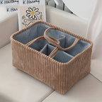 Brown storage basket with striped interior on a light-colored surface