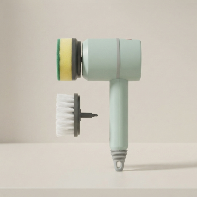 A mint green handheld electric hair dryer with two interchangeable brush attachments, shown on a clean, light beige background.