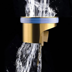 Gold shower head with water flowing against a black background