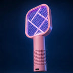 A pink handheld electric insect killer lamp with a UV light head, shown against a dark blue background.