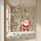 A festive Christmas wall decal or art print featuring Santa Claus, woodland animals, a decorated tree, and snowflakes, shown applied to a window or glass pane in an indoor setting.