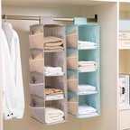 Clothing organizer hanging on a closet rod with clothes inside