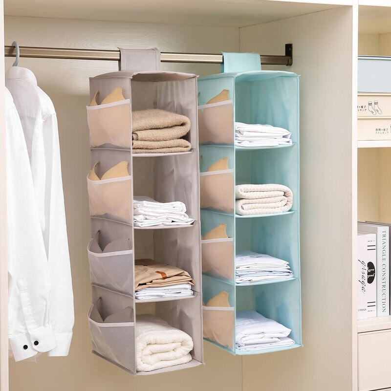 Clothing organizer hanging on a closet rod with clothes inside