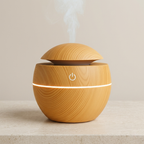 Wooden diffuser emitting steam on a neutral background