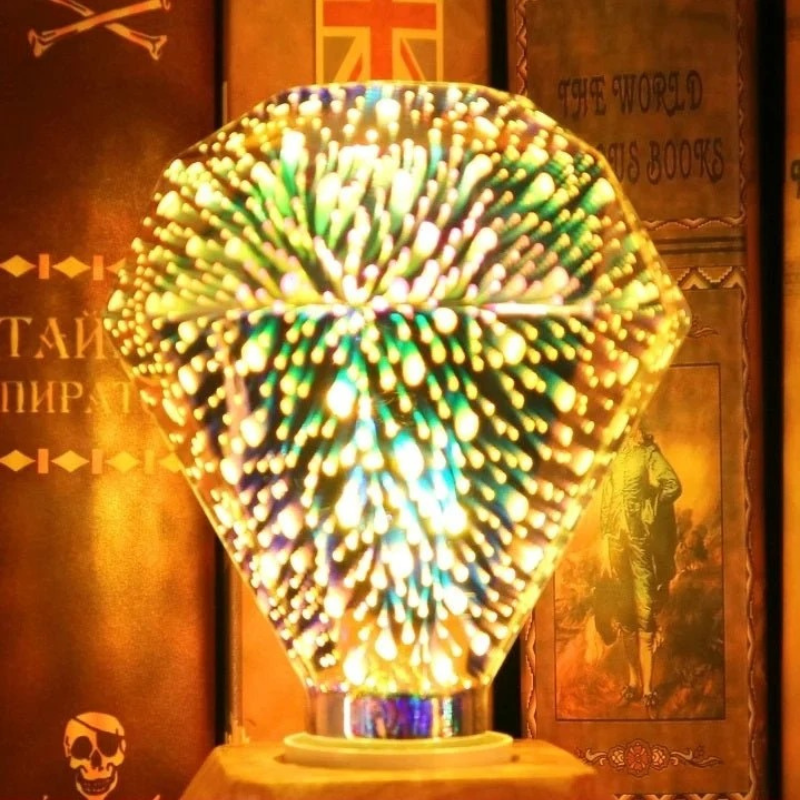A faceted crystal lamp shaped like a large gemstone, glowing with warm yellow light and reflecting green, blue, and purple iridescent tones, set against a dark vintage book background.