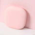 Pink oval object on a light pink background