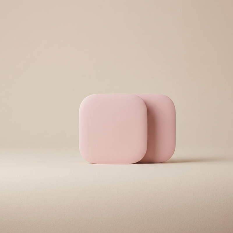 Pink square object on a beige background