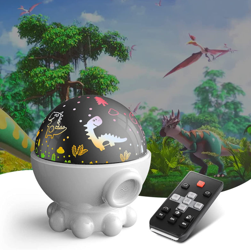 A dinosaur-themed night light projector with a white base and a rotating dome that shows colorful dinosaur illustrations, shown alongside a black remote control. The background is a digital illustration of a prehistoric forest with pterosaurs and a dinosaur.