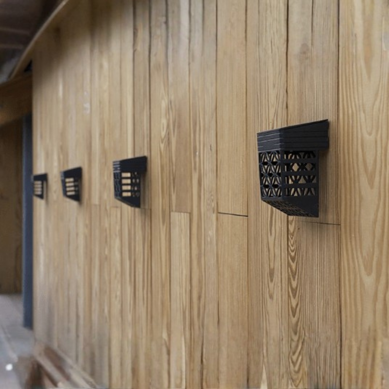 Wooden wall with black geometric patterns