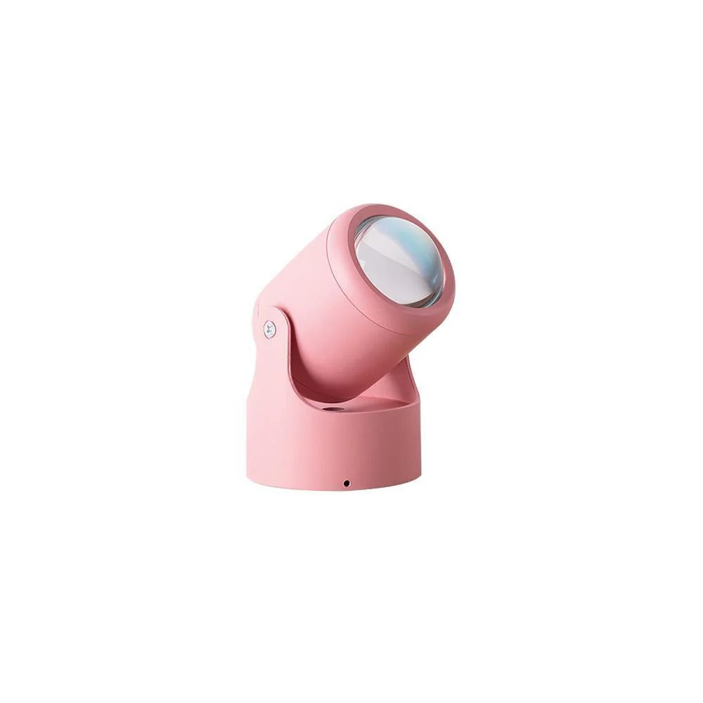 Pink magnifying lamp on a white background