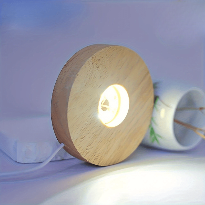 Wooden night light emitting a warm glow on a soft focus background