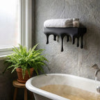 Melting Black Floating Shelf - Artistic Drip Design for Stylish Wall Displays 1