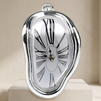 Surrealistic clock with melting effect on a beige background
