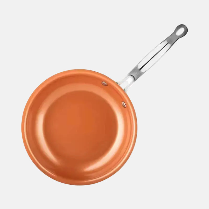 Orange frying pan with a silver handle on a white background