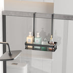 Bathroom shelf with toiletries against a glass shower wall
