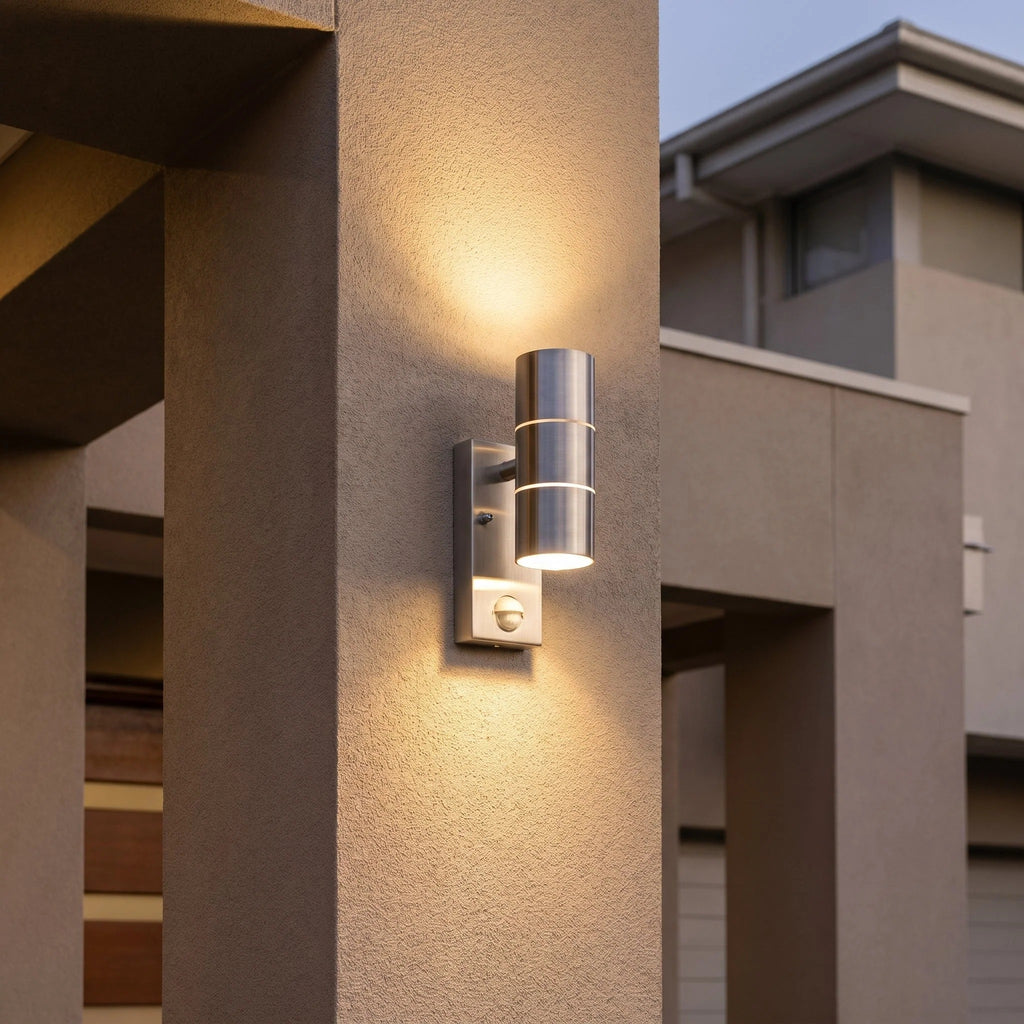 Modern outdoor wall light fixture on a building exterior