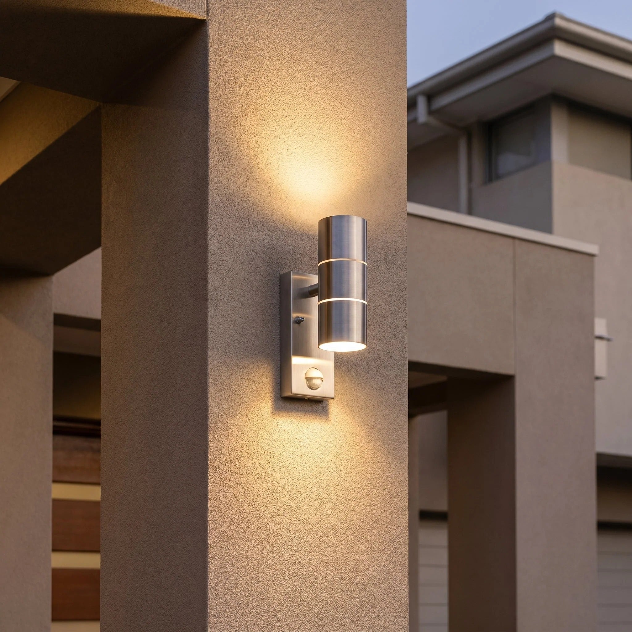 Modern outdoor wall light fixture on a building exterior