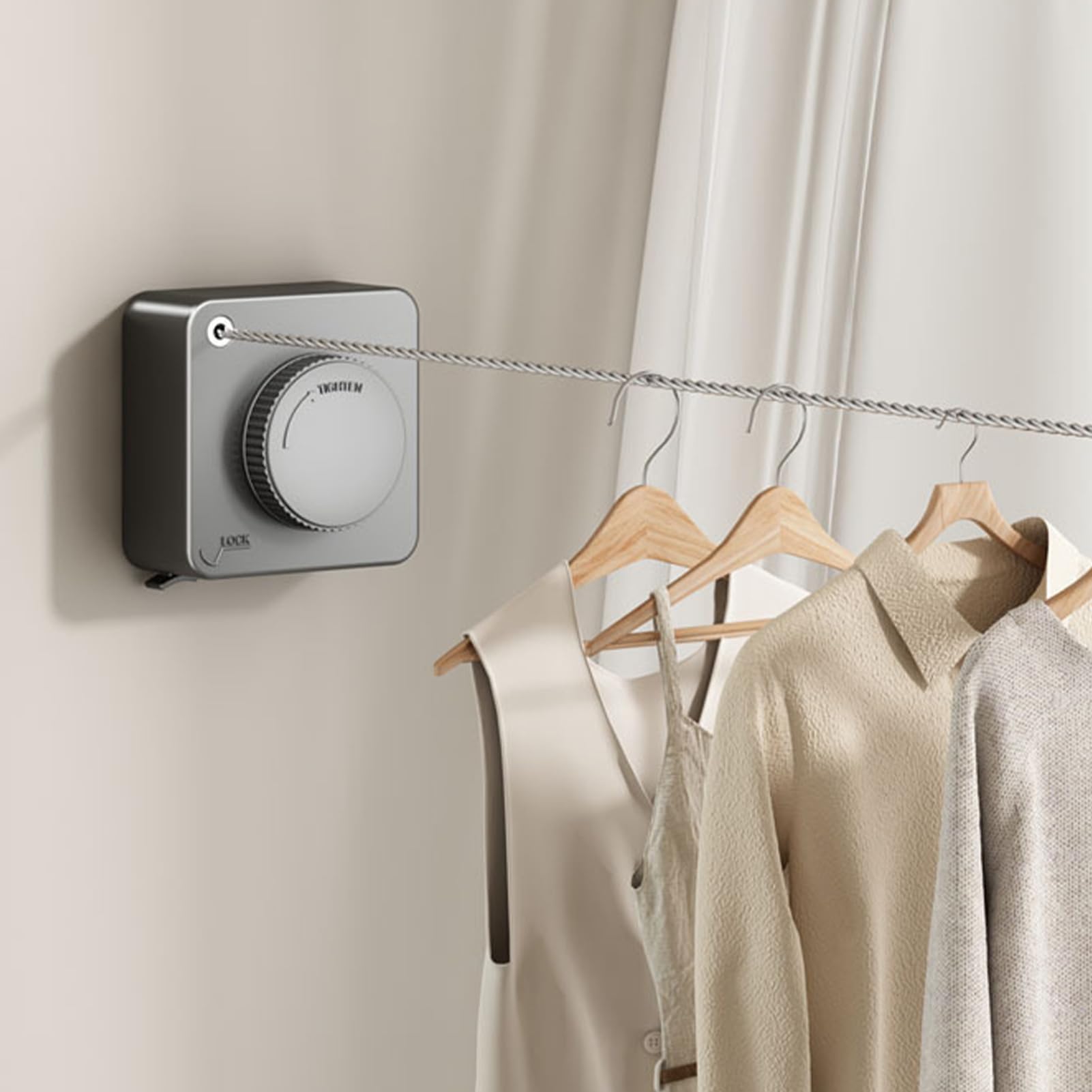 Wall-mounted clothesline system with hangers and clothes in a neutral setting