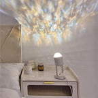 Modern nightstand with decorative lamp and nightlight projection on wall