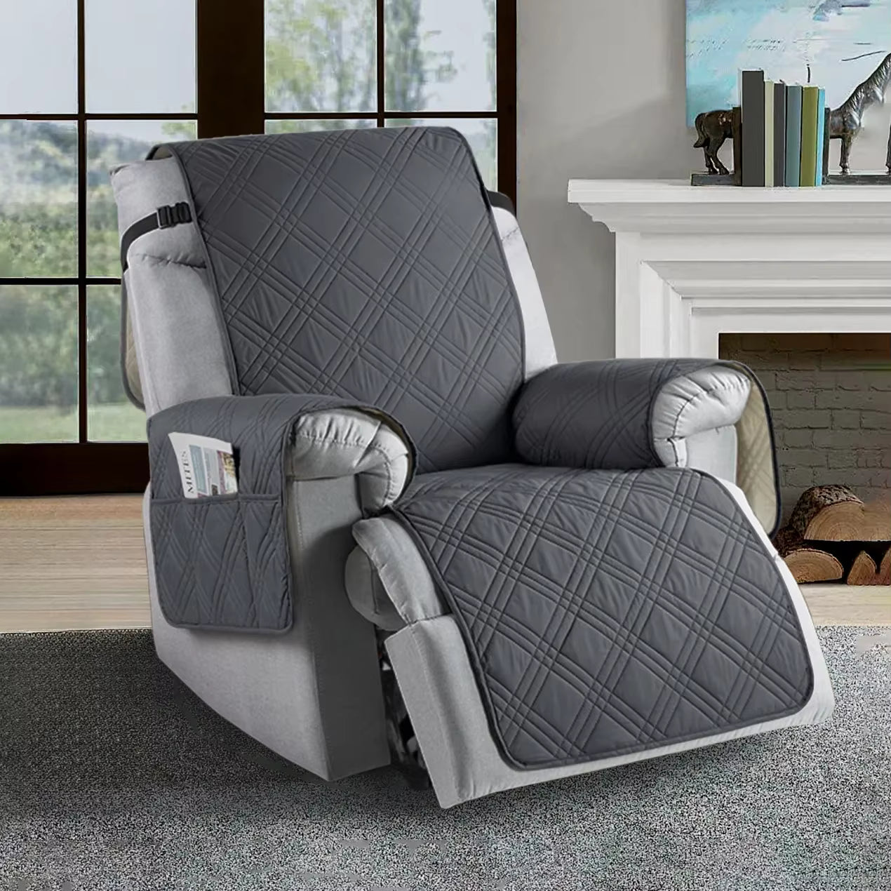 Gray recliner chair with a quilted cover in a living room setting.